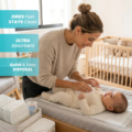 Parent using KidEasy 0-6 Months disposable changing pad for newborn diaper change