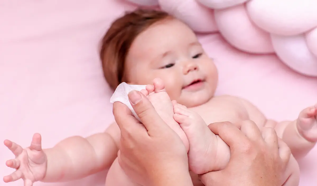 KidEasy dry baby wipe used for the final dry step before a fresh diaper